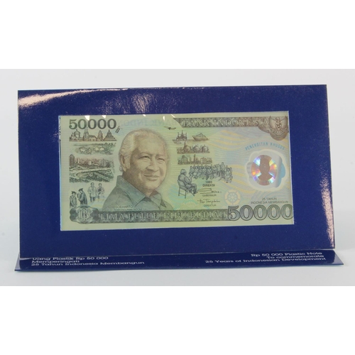 779 - Indonesia 50000 Rupiah issued 1993, Commemorative polymer note in presentation folder commemorating ... 