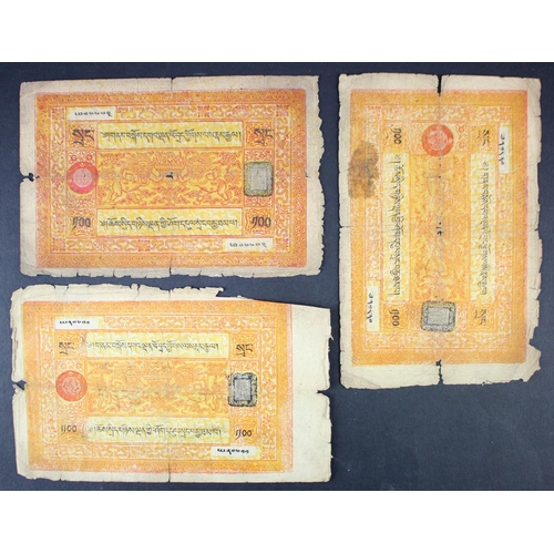 910 - Tibet 100 Srang (3) issued 1942 - 1959 (BNB B113, Pick11) lower grades with tears/holes/dirt