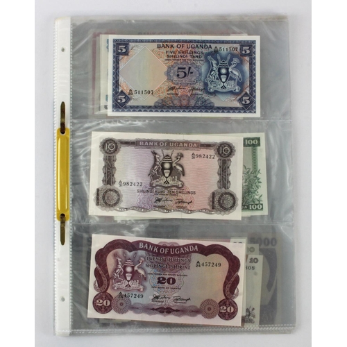 919 - Uganda (35), an Uncirculated group in album pages, 5 Shillings, 10 Shillings, 20 Shillings, 50 Shill... 