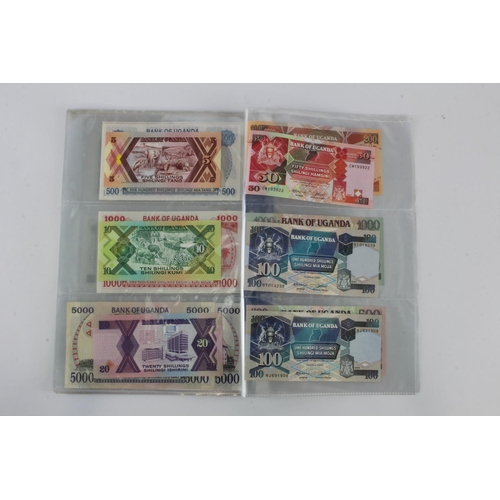 919 - Uganda (35), an Uncirculated group in album pages, 5 Shillings, 10 Shillings, 20 Shillings, 50 Shill... 