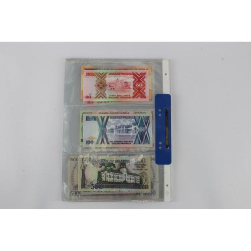 919 - Uganda (35), an Uncirculated group in album pages, 5 Shillings, 10 Shillings, 20 Shillings, 50 Shill... 