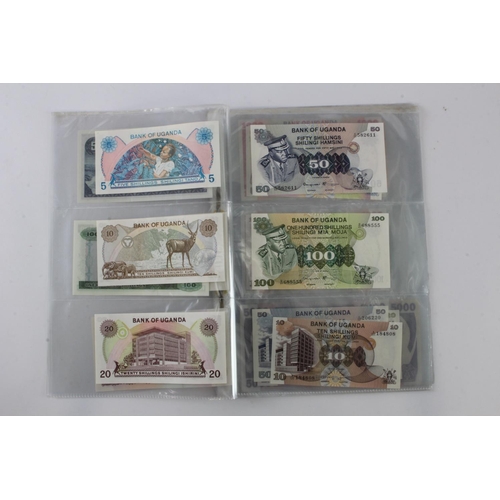 919 - Uganda (35), an Uncirculated group in album pages, 5 Shillings, 10 Shillings, 20 Shillings, 50 Shill... 