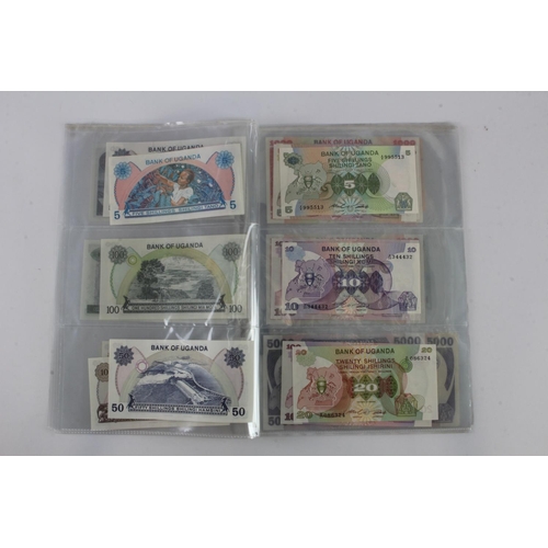 919 - Uganda (35), an Uncirculated group in album pages, 5 Shillings, 10 Shillings, 20 Shillings, 50 Shill... 