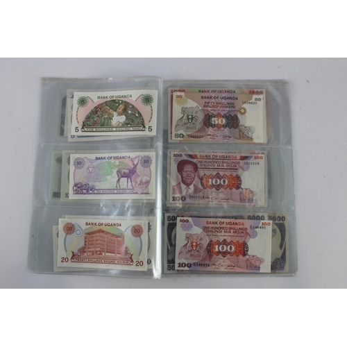 919 - Uganda (35), an Uncirculated group in album pages, 5 Shillings, 10 Shillings, 20 Shillings, 50 Shill... 