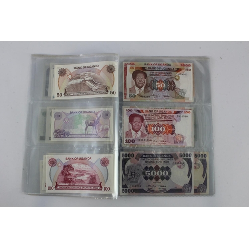 919 - Uganda (35), an Uncirculated group in album pages, 5 Shillings, 10 Shillings, 20 Shillings, 50 Shill... 