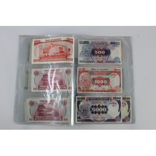 919 - Uganda (35), an Uncirculated group in album pages, 5 Shillings, 10 Shillings, 20 Shillings, 50 Shill... 