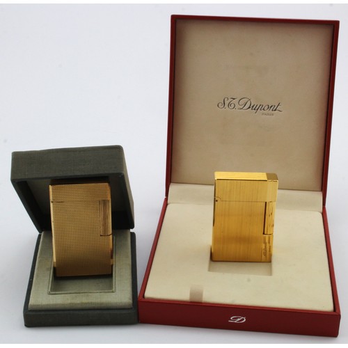 616 - St. Dupont. Two gold plated lighters by S. T. Dupont, both contained in original cases