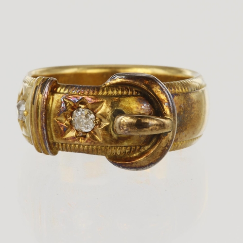 114 - 18ct yellow gold buckle ring set with two round old cut diamonds in Gypsy settings, total diamond we... 