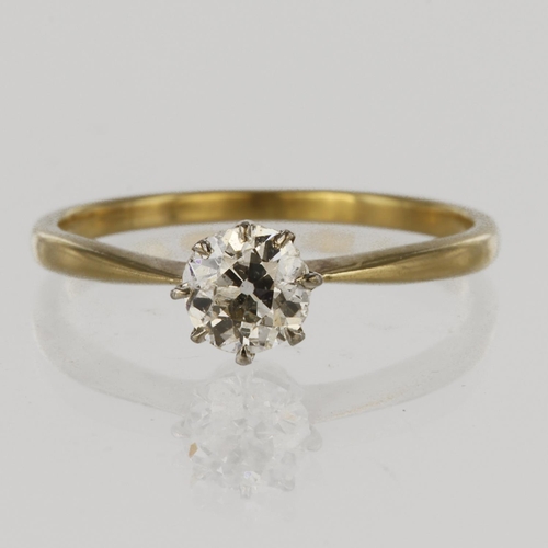 12 - Tested as 18ct yellow gold solitaire ring set with single round brilliant cut diamond calculated as ... 