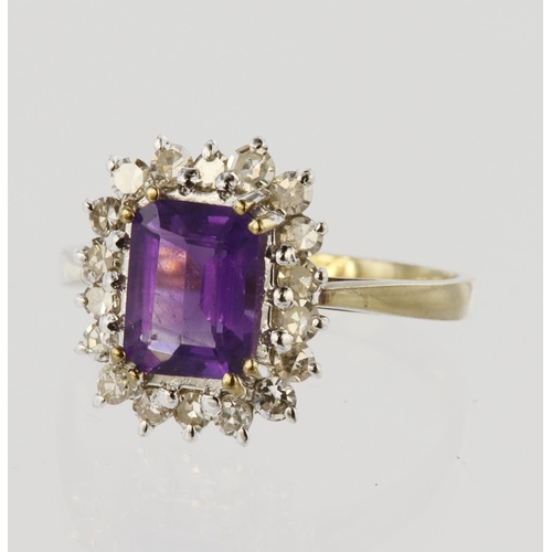 123 - 9ct yellow gold cluster ring set with a central step cut amethyst measuring approx. 8mm x 6mm, surro... 