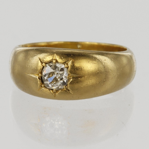 124 - 18ct yellow gold flared band ring set with a round old cut diamond calculated as weighing approx. 0.... 