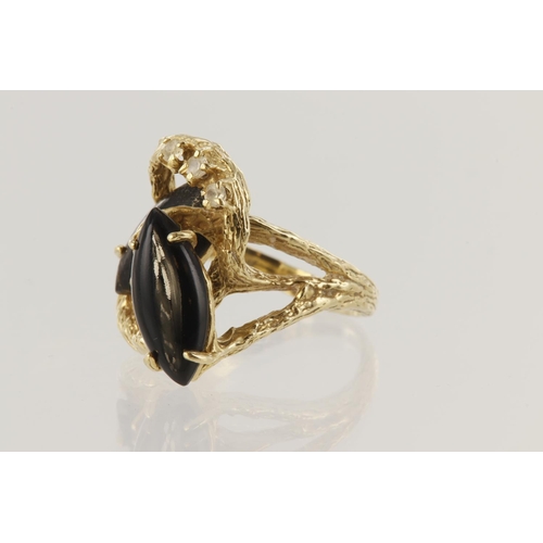 134 - 14ct dress ring featuring two marquise shaped onyx measuring approx. 14mm x 6mm and three paste high... 