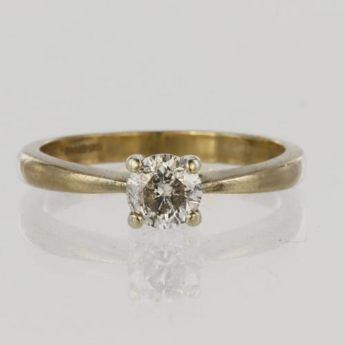 137 - 9ct yellow gold solitaire ring set with a round brilliant cut diamond in four claw white gold mount,... 