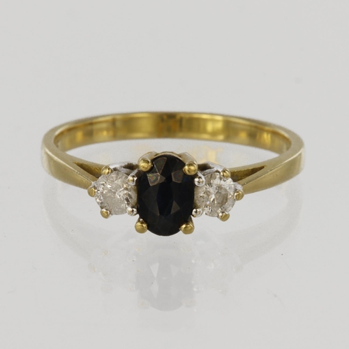 160 - 18ct yellow gold trilogy ring set with central oval sapphire measuring approx. 6mm x 4mm, with a rou... 