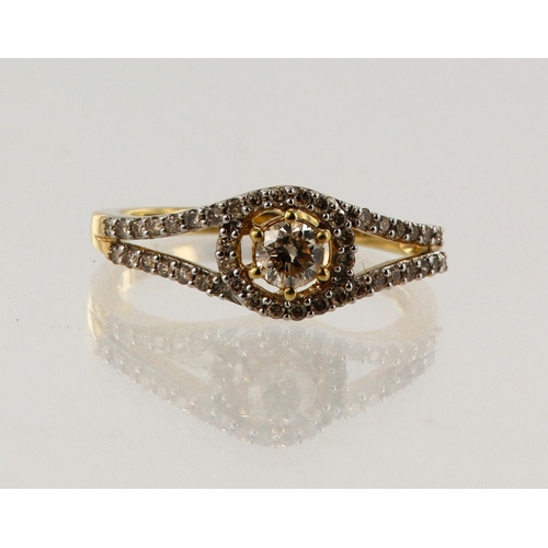 166 - 18ct yellow gold diamond halo dress ring, principle round brilliant cut diamond approx. 0.21ct, esti... 