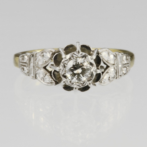 167 - 18ct yellow gold solitaire ring with white gold decorative shoulders and raised head with illusion s... 