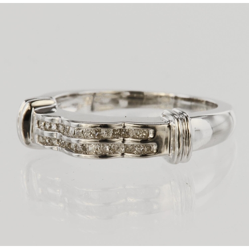 172 - 14ct white gold band ring set with two rows of channel set diamonds, eachrow set with sixteen prince... 