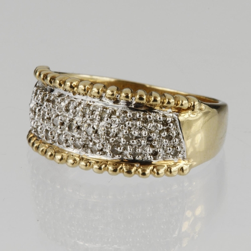 177 - 9ct yellow gold band ring set with thirty round brilliant cut diamonds in a white gold pave setting,... 