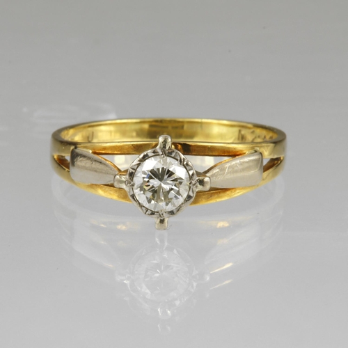 180 - 18ct yellow gold ring with raised 18ct white gold head and shoulder detail, set with a single round ... 