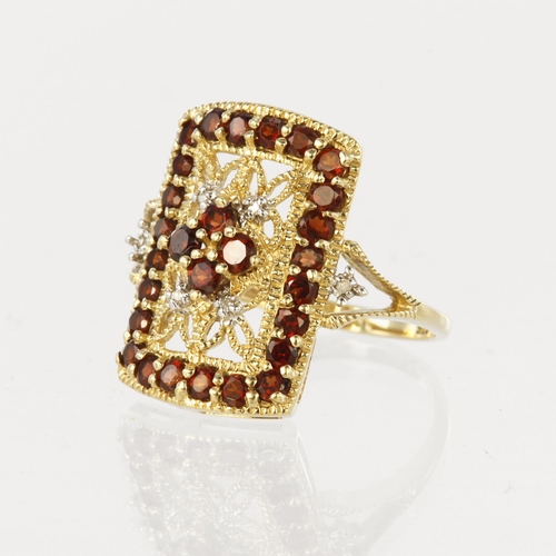 21 - 9ct yellow gold rectangular shaped filigree plaque dress ring measuring approx. 19mm x 14mm, set wit... 