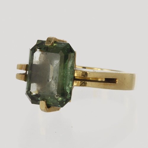 26 - 9ct yellow gold dress ring set with single step cut green tourmaline measuring approx. 12mm x 10mm, ... 