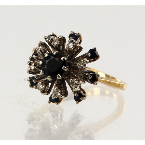 4 - Yellow gold (tests 18ct) diamond and sapphire star burst cluster ring, principle sapphire measures 5... 