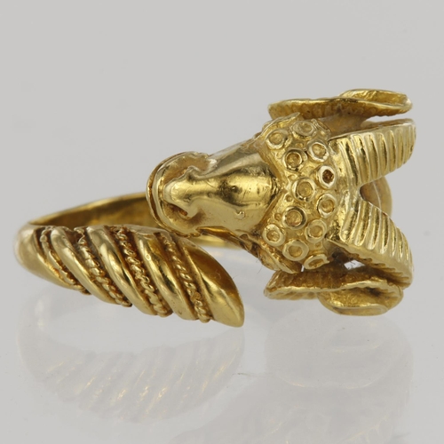 44 - 18ct yellow gold adjjustable open ring depicting a rams head, finger size O, weight 10.3g