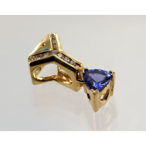 477 - Yellow gold (tests 14ct ) diamond and tanzanite pendant, triangle shaped tanzanite measures 6mm, ten... 