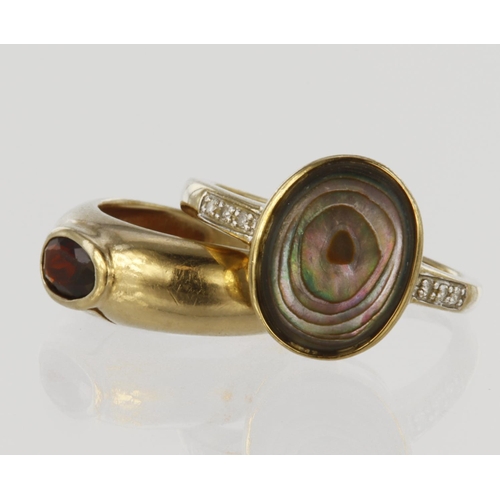 478 - Two rings to include 9ct yellow gold band ring set with oval garnet, finger size H, weight 2.3g. 9ct... 