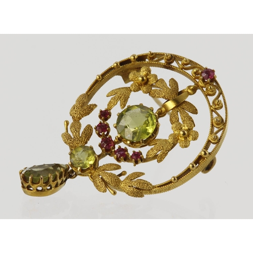 489 - Tests as approx. 20ct circular brooch of foliate design set with central peridot measuring approx. 7... 