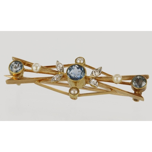 490 - 14ct yellow gold brooch set with blue topaz, diamonds and seed pearls. Centre blue topaz measuring a... 