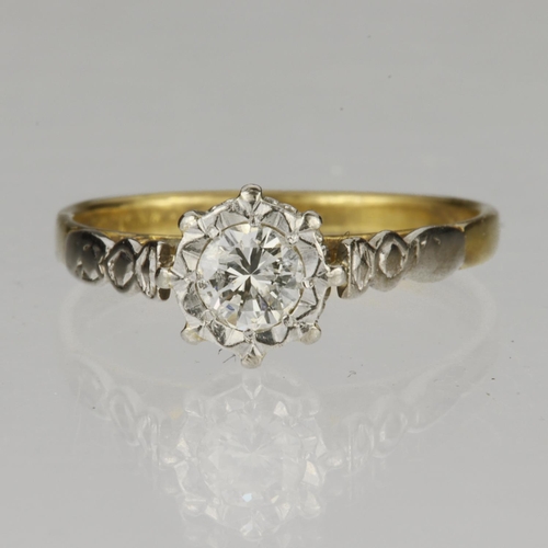 50 - 18ct yellow gold and platinum ring set with single round brilliant cut diamond in an illusion settin... 