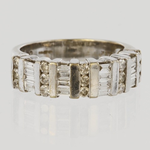 53 - 18ct white gold half eternity ring set with sixteen bagette cut diamonds and fifteen round brilliant... 