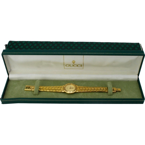 538 - Ladies gold plated Gucci 3300L quartz wristwatch. The gilt dial with gilt hands. Case size approx 25... 