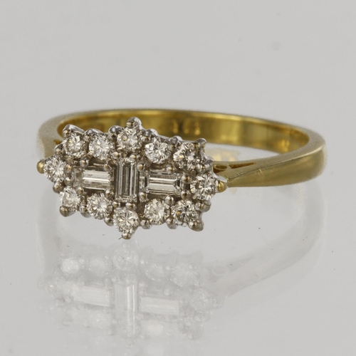 56 - 18ct yellow gold cluster ring set with three baguette cut diamonds surrounded by twelve round brilli... 