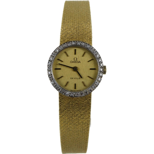 624 - Ladies 18ct cased diamond set Omega De Ville manual wind wristwatch, circa 1973. The gilt dial with ... 