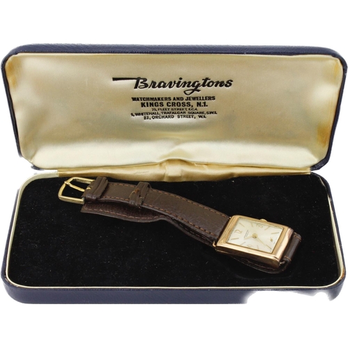 657 - Gents 9ct cased manual wind wristwatch by Bravingtons, circa 1939. The silvered dial with gilt Arabi... 