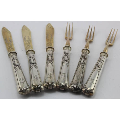 875 - Three pairs of German 800 grade silver handled fruit knives & forks with silver-gilt blades & tines,... 