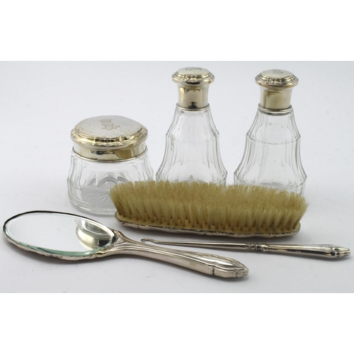 914 - German silver and glass six piece vanity set, with monogram and crown above to each, circa late 19th... 