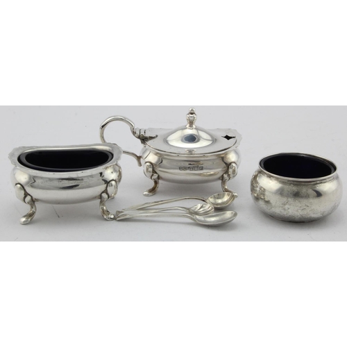 917 - Three silver cruet items two salt pots and a mustard pot with three blue glass liners plus three sil... 