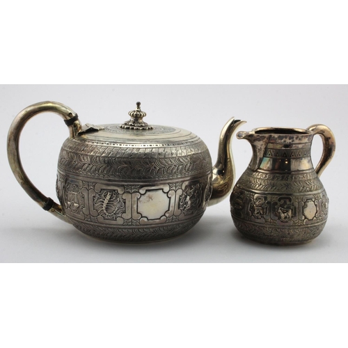 937 - Silver teapot and milk jug, with ornate engraved decoration, hallmarked 'GF, London 1872  (George Fo... 