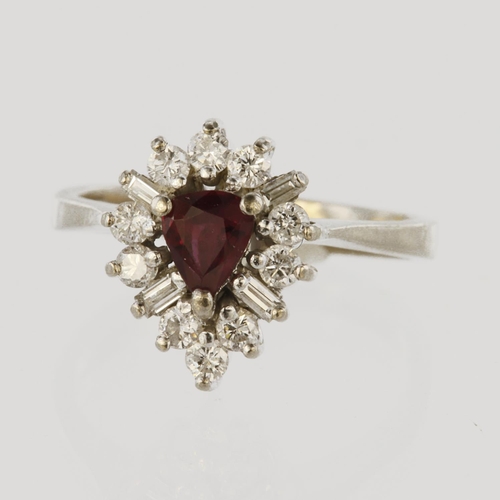 95 - 18ct white gold cluster ring set with a central pear shaped ruby measuring approx. 5mm x 4mm, surrou... 