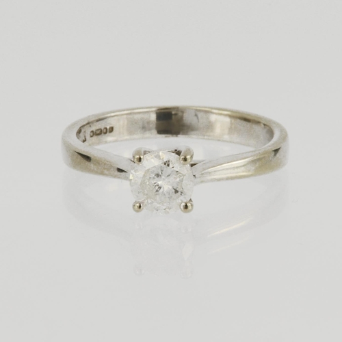 99 - 18ct white gold solitaire ring set with round brilliant cut diamond in a four claw mount, approx. di... 