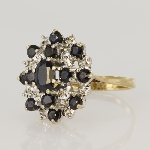 133 - 9ct yellow gold sapphire and diamond cluster ring comprising central oval sapphire measuring approx.... 