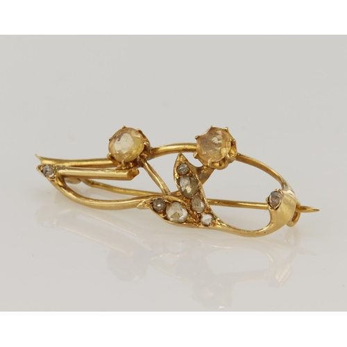 491 - Yellow gold (tests 18ct) antique diamond and yellow topaz brooch, eight rose cut diamonds principle ... 