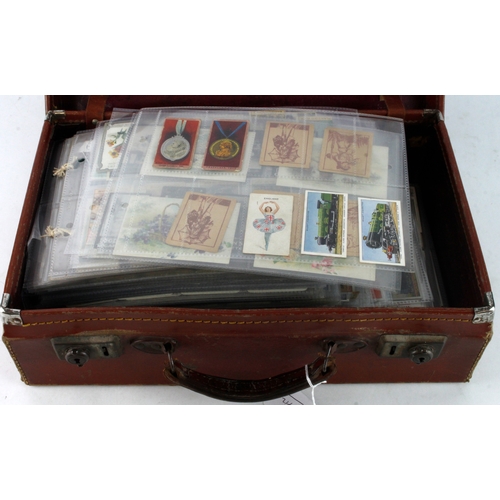 521 - Brown suitcase housing a large qty of Cigarette cards, in plastic pages, many interesting and unusua... 