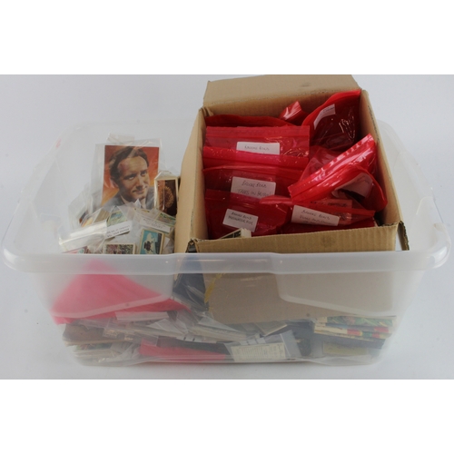 588 - Large plastic crate of cigarette / trade and some Brook Bond cards. Loose, in packets and some stuck... 