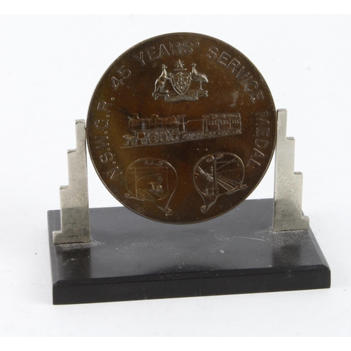 1193 - Railway - New South Wales 45 years bronze Service Medal (on stand) to A.L. Keefer