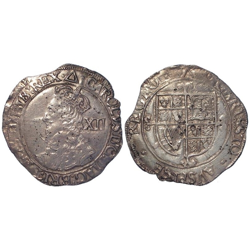 854 - Charles I hammered silver Shilling mm. triangle, S.2799, VF, light porosity.