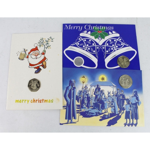 883 - Christmas 50p's (3) cupro-nickel diamond finish in greetings cards, with certs: Gibraltar: 1991, 199... 